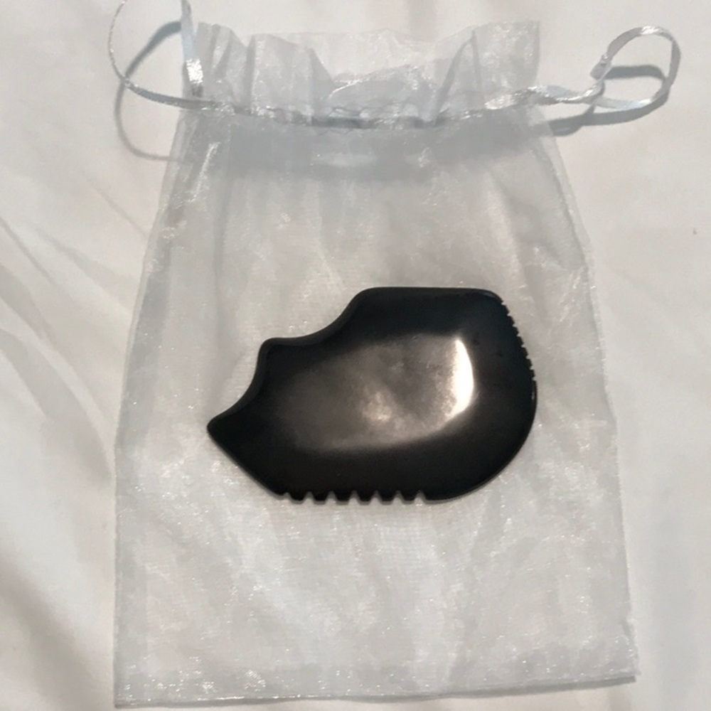 Obsidian stone face massager